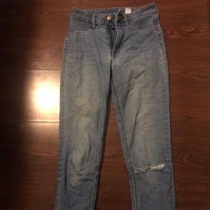 Basic jeans with a rip in the knee